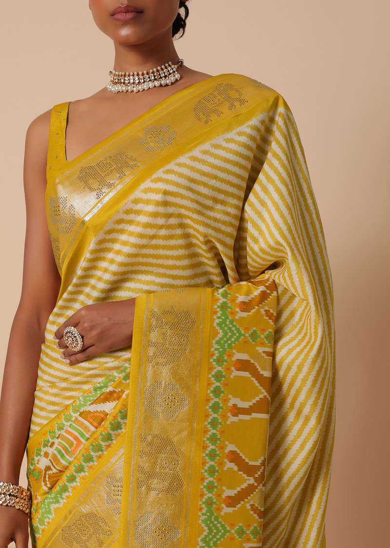 Yellow Patola Saree In Dola Silk With Foil Printed Border And Unstitched Blouse Piece