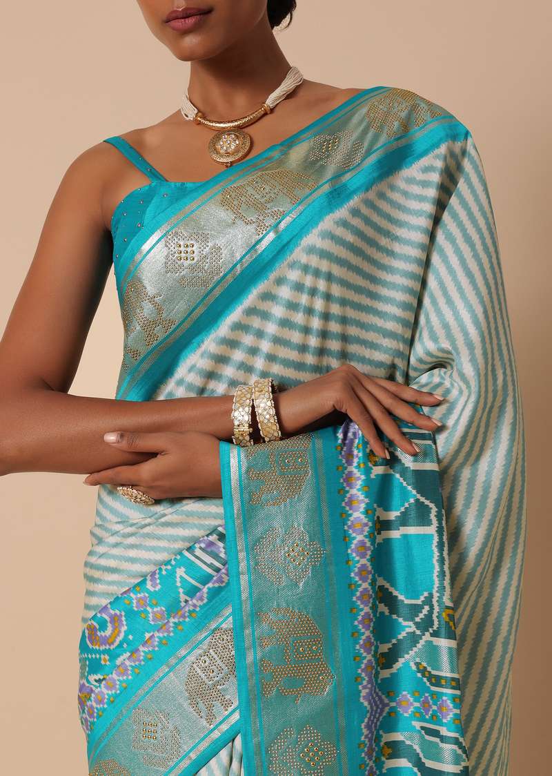 Sea Blue Patola Saree In Silk With Foil Worked Border And Unstitched Blouse Piece