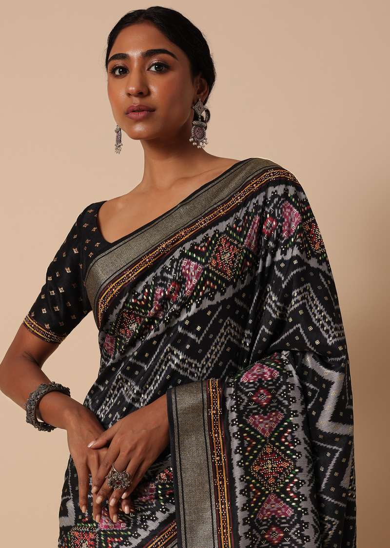  Black Silk Saree With Foil And Patola Print And Unstitched Blouse Piece